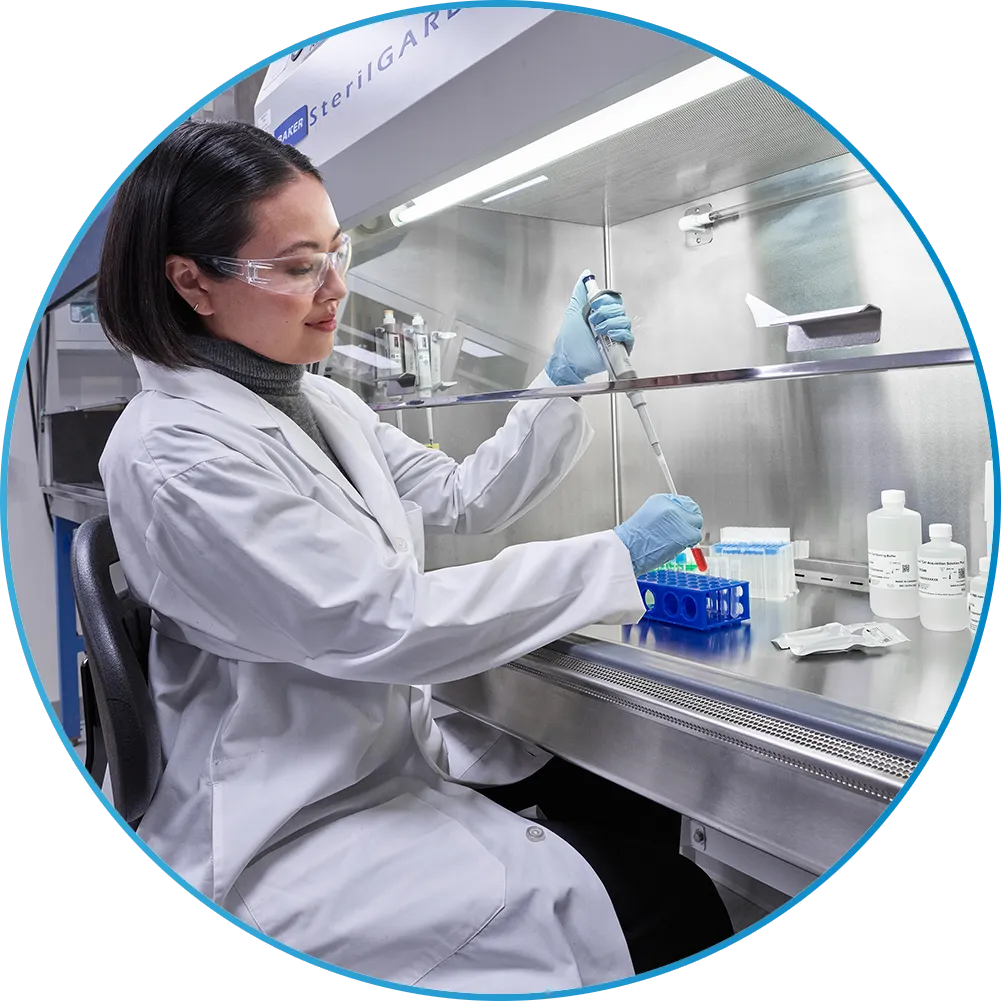 scientist with pipette and samples in lab